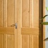 Solid oak pair of four panel doors