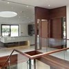 Contemporary glass and walnut balustrade