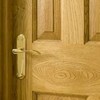 Bespoke fire panel solid oak door detail