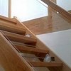 Open tread oak staircase with glass balustrade