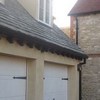 Painted hardwood sliding sash windows and garage doors