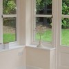 Painted hardwood windows and french doors